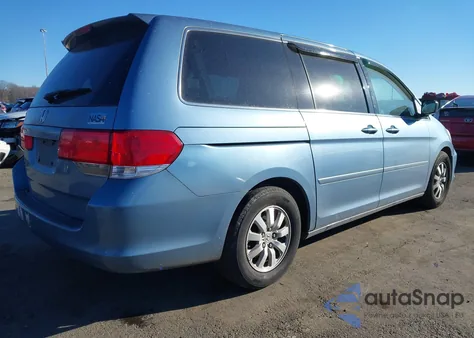 2010 Honda Odyssey Ex-L z USA, uszkodzony, nr VIN 5FNRL3H75AB050333